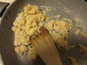 Stick clump of onions and flower with a bit of milk in them.