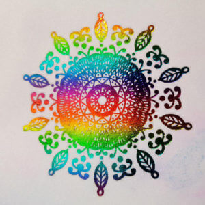 Mandala picture shining with rainbow shimmer.